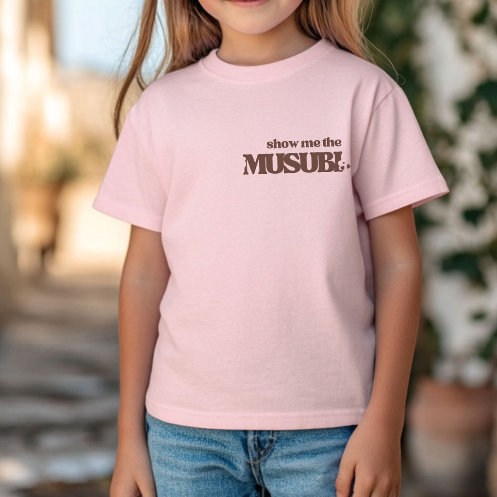 Light pink kids t-shirt with Show Me the Musubi text, playful Hawaii foodie shirt for island-loving families